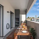 Rooftop Pools & Balcony Haven By Hostwise Apartman